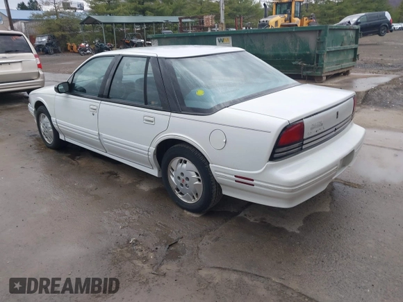 1996 Oldsmobile Cutlass Supreme S z VIN 1G3WH52M8TF346878, wystawiony jako IAAI lot #41827990 z przebiegiem 124 705 mil mil oraz . Historia ofert i sprzedaży dostępna na DreamBid. Obrazek 3.