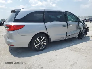 2023 Honda Odyssey Touring z VIN 5FNRL6H8XPB037385, wystawiony jako Copart lot #59461215 z przebiegiem 32 150 mil mil oraz Szkoda całkowita • Salvage title. Historia ofert i sprzedaży dostępna na DreamBid. Obrazek 3.
