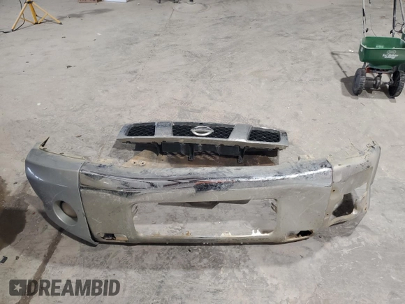 2007 Nissan Titan SE z VIN 1N6BA07B87N226908, wystawiony jako Copart lot #86951184 z przebiegiem 233 741 mil mil oraz Szkoda całkowita • Salvage title. Historia ofert i sprzedaży dostępna na DreamBid. Obrazek 14.