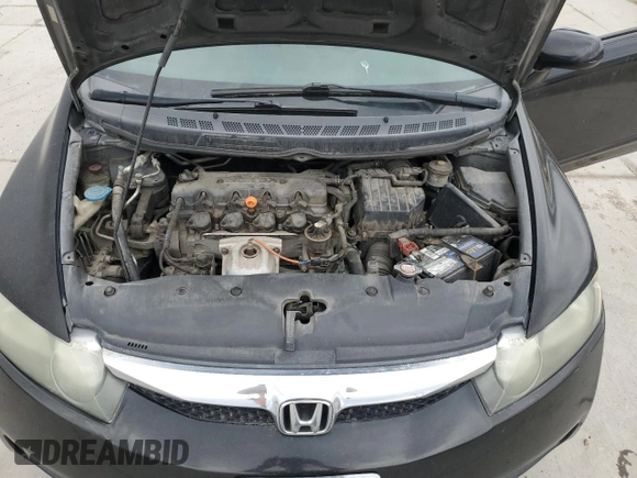 2009 Honda Civic LX z VIN 2HGFA16559H319601, wystawiony jako Copart lot #54408975 z przebiegiem 143 093 mil mil oraz Szkoda całkowita • Salvage title. Historia ofert i sprzedaży dostępna na DreamBid. Obrazek 11.