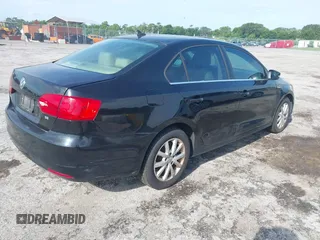 2014 Volkswagen Jetta SE with VIN 3VWD07AJ6EM413088, listed as a IAAI auction lot 42541755 with 163,278 mi miles and . Bid and sale history available at DreamBid. Image 4.