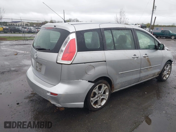 2009 Mazda Mazda5 Sport with VIN JM1CR293490334170, listed as a IAAI auction lot 41972688 with 125,137 mi miles. Bid and sale history available at carsss.com. Image 4.
