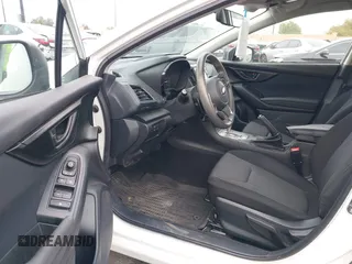 2021 Subaru Impreza Premium with VIN 4S3GKAV61M3604298, listed as a IAAI auction lot 42011198 with 50,667 mi miles and . Bid and sale history available at DreamBid. Image 5.