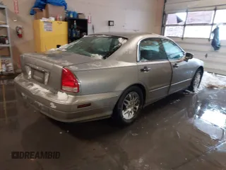 2002 Mitsubishi Diamante LS z VIN 6MMAP67P32T005867, wystawiony jako IAAI lot #41586460 z przebiegiem 390 586 mil mil oraz . Historia ofert i sprzedaży dostępna na DreamBid. Obrazek 4.