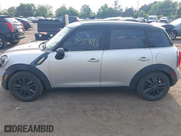 2012 MINI Countryman с VIN WMWZB3C5XCWM30143, выставлен на аукционе IAAI как лот 42404893 с пробегом 143 836 миль миль и . История ставок и продаж доступна на DreamBid. Изображение 14.