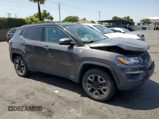 2017 Jeep Compass Trailhawk with VIN 3C4NJDDB8HT674627, listed as a Copart auction lot 59790325 with 66,349 mi miles and Salvage title. Bid and sale history available at DreamBid. Image 4.