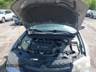 2014 Dodge Avenger SE with VIN 1C3CDZAB0EN133684, listed as a IAAI auction lot 41923432 with 158,771 mi miles and . Bid and sale history available at DreamBid. Image 10.