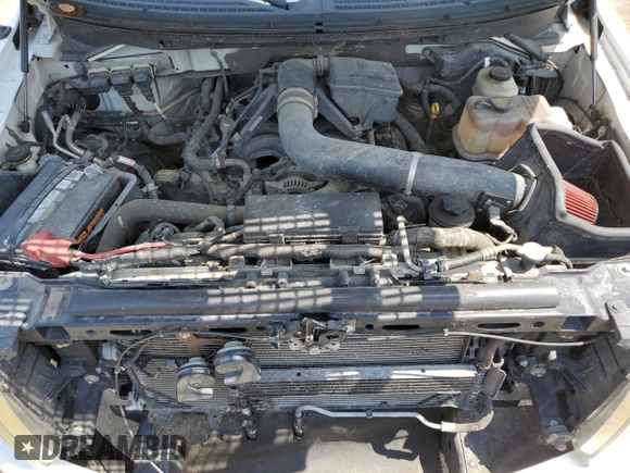 2010 Ford F-150 XL with VIN 1FTFW1EVXAKA38747, listed as a Copart auction lot 58900465 with 120,933 mi miles and Salvage title. Bid and sale history available at DreamBid. Image 11.