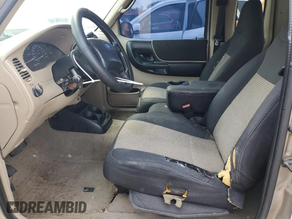 2003 Ford Ranger XL Fleet z VIN 1FTZR45E13PB20412, wystawiony jako Copart lot #60357605 z przebiegiem 190 398 mil mil oraz Czysty tytuł • Clean title. Historia ofert i sprzedaży dostępna na DreamBid. Obrazek 7.