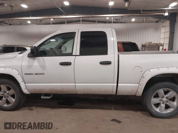 2007 Dodge 1500 SLT with VIN 1D7HU18297J631097, listed as a IAAI auction lot 41378054 with 169,263 mi miles and . Bid and sale history available at DreamBid. Image 14.
