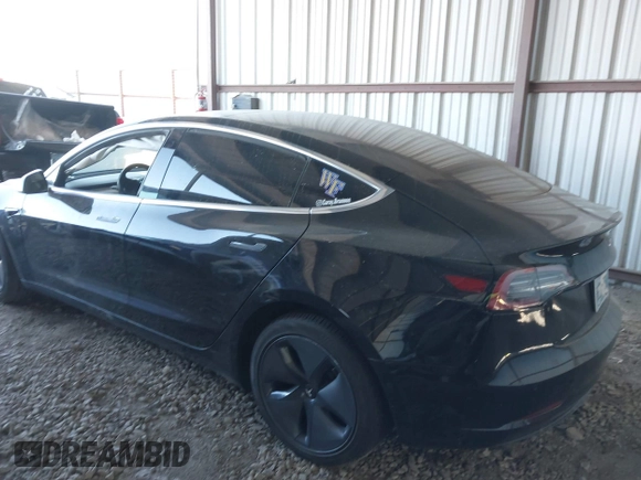 2019 Tesla Model 3 Mid Range with VIN 5YJ3E1EA4KF399151, listed as a IAAI auction lot 41840425 with Not Provided miles and . Bid and sale history available at DreamBid. Image 3.