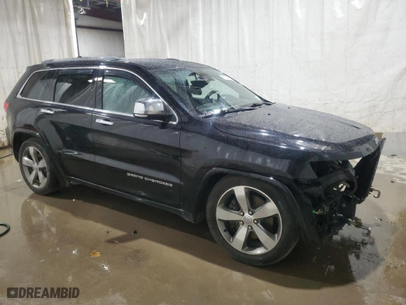 2014 Jeep Grand Cherokee Overland with VIN 1C4RJFCM2EC298661, listed as a Copart auction lot 81331004 with 245,716 mi miles and Salvage Title. Bid and sale history available at carsss.com. Image 4.
