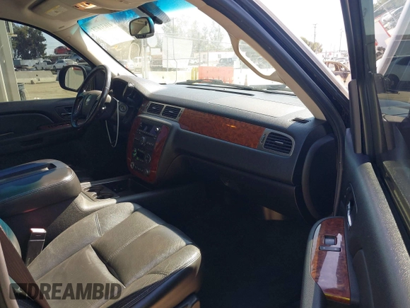 2007 Chevrolet Suburban LT with VIN 3GNFC16J07G243215, listed as a IAAI auction lot 41631673 with 200,990 mi miles and . Bid and sale history available at DreamBid. Image 5.