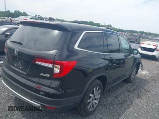 2021 Honda Pilot EX-L with VIN 5FNYF6H53MB097089, listed as a IAAI auction lot 42309359 with 58,371 mi miles and . Bid and sale history available at DreamBid. Image 4.
