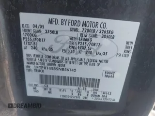 2005 Ford F-150 XLT with VIN 1FTPX14585NB56142, listed as a IAAI auction lot 42168338 with 208,074 mi miles. Bid and sale history available at carsss.com. Image 9.