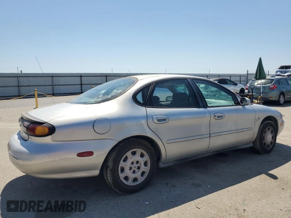 1997 Ford Taurus GL with VIN 1FALP5228VG222228, listed as a Copart auction lot 64806845 with 160,397 mi miles and Salvage title. Bid and sale history available at DreamBid. Image 3.