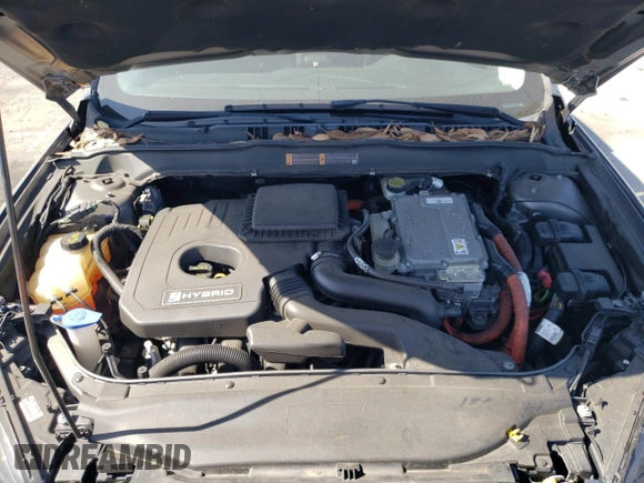 2013 Ford Fusion SE Hybrid z VIN 3FA6P0LUXDR362711, wystawiony jako Copart lot #57060425 z przebiegiem 155 031 mil mil oraz Szkoda całkowita • Salvage title. Historia ofert i sprzedaży dostępna na DreamBid. Obrazek 11.