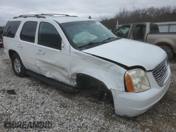 2012 GMC Yukon SLT with VIN 1GKS2CE09CR122728, listed as a Copart auction lot 87093604 with 124,739 mi miles and Salvage Title. Bid and sale history available at carsss.com. Image 4.