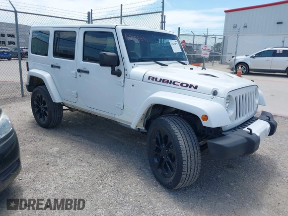 2015 Jeep Wrangler Unlimited Rubicon z VIN 1C4BJWFG1FL544883, wystawiony jako IAAI lot #42838891 z przebiegiem 87 801 mil mil oraz . Historia ofert i sprzedaży dostępna na DreamBid. Obrazek 1.