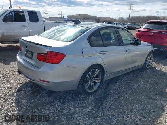 2015 BMW 3 Series 328i with VIN WBA3A5C55FF609490, listed as a IAAI auction lot 42006008 with 110,239 mi miles. Bid and sale history available at carsss.com. Image 4.