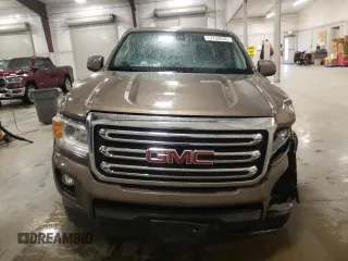 2015 GMC Canyon 4WD SLE z VIN 1GTG6BE3XF1242163, wystawiony jako Copart lot #57132035 z przebiegiem 110 241 mil mil oraz Szkoda całkowita • Salvage title. Historia ofert i sprzedaży dostępna na DreamBid. Obrazek 5.