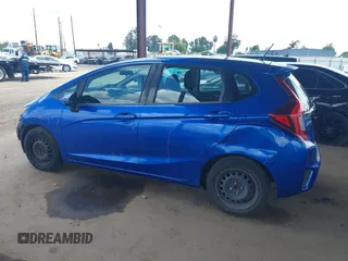 2015 Honda Fit LX z VIN 3HGGK5H51FM711607, wystawiony jako IAAI lot #42249495 z przebiegiem Nie podano mil oraz . Historia ofert i sprzedaży dostępna na DreamBid. Obrazek 15.