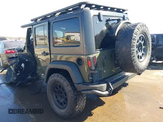 2015 Jeep Wrangler Unlimited Rubicon with VIN 1C4BJWFG0FL623431, listed as a IAAI auction lot 41651317 with 105,508 mi miles. Bid and sale history available at carsss.com. Image 3.