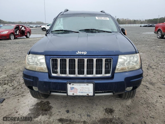 2004 Jeep Grand Cherokee Laredo with VIN 1J4GX48S64C165105, listed as a Copart auction lot 50301455 with 299,686 mi miles and Salvage Title. Bid and sale history available at carsss.com. Image 5.