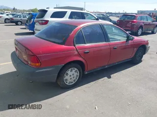 1996 Saturn SL with VIN 1G8ZG5289TZ214790, listed as a IAAI auction lot 42090262 with 197,485 mi miles. Bid and sale history available at carsss.com. Image 4.