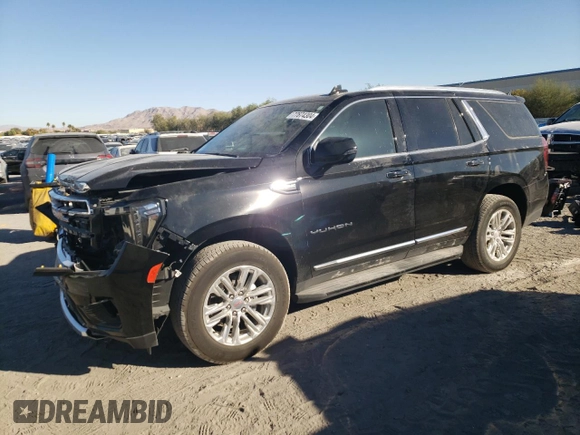 2022 GMC Yukon SLT with VIN 1GKS2BKD5NR356479, listed as a Copart auction lot 77674304 with 33,580 mi miles and Salvage Title. Bid and sale history available at carsss.com. Image 1.