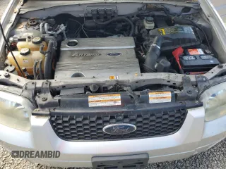 2006 Ford Escape Hybrid z VIN 1FMCU96H36KA35403, wystawiony jako Copart lot #65374705 z przebiegiem 127 689 mil mil oraz Czysty tytuł • Clean title. Historia ofert i sprzedaży dostępna na DreamBid. Obrazek 11.