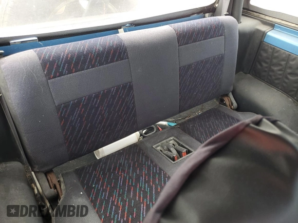 1994 Geo Tracker z VIN 2CNBE18U1R6918878, wystawiony jako Copart lot #75894834 z przebiegiem Nie podano mil oraz Nie do naprawy. Historia ofert i sprzedaży dostępna na DreamBid. Obrazek 10.