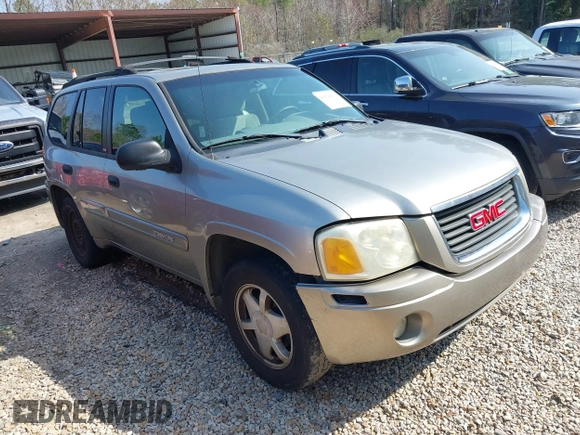 2003 GMC Envoy SLT z VIN 1GKDS13S932106295, wystawiony jako IAAI lot #41594814 z przebiegiem 199 597 mil mil oraz . Historia ofert i sprzedaży dostępna na DreamBid. Obrazek 1.