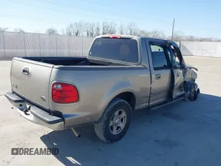 2002 Ford F-150 XLT with VIN 1FTRW07672KB31448, listed as a IAAI auction lot 41226836 with 265,234 mi miles. Bid and sale history available at carsss.com. Image 4.