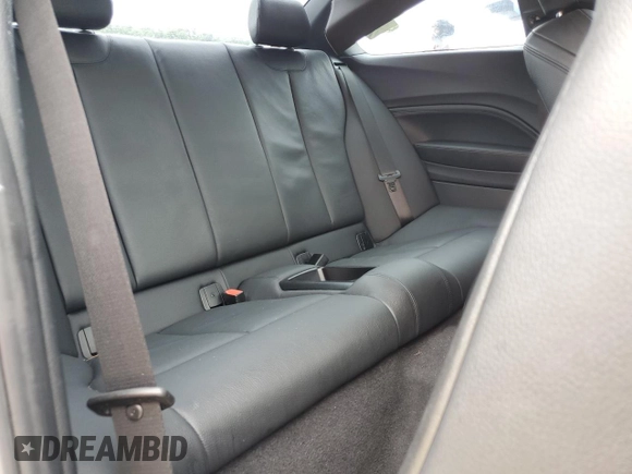 2018 BMW 2 Series 230i xDrive with VIN WBA2J3C54JVA49821, listed as a Copart auction lot 61046555 with 51,167 mi miles and Salvage title. Bid and sale history available at DreamBid. Image 10.