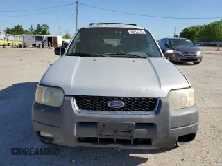 2002 Ford Escape XLT Choice with VIN 1FMCU04162KB00207, listed as a Copart auction lot 56414275 with 143,085 mi miles and Salvage title. Bid and sale history available at DreamBid. Image 5.