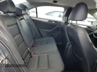 2013 Volkswagen Jetta SE z VIN 3VWDP7AJ7DM209538, wystawiony jako Copart lot #59799815 z przebiegiem 117 073 mil mil oraz Szkoda całkowita • Salvage title. Historia ofert i sprzedaży dostępna na DreamBid. Obrazek 10.
