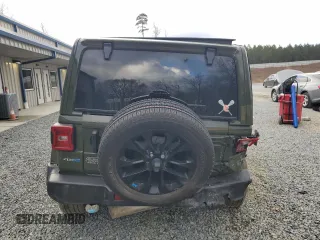 2023 Jeep Wrangler Sahara with VIN 1C4JJXP62PW553101, listed as a Copart auction lot 85543124 with 28,157 mi miles and Salvage Title. Bid and sale history available at DreamBid. Image 6.