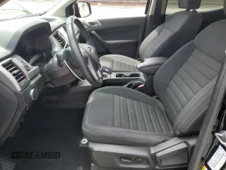 2023 Ford Ranger XL with VIN 1FTER4EH4PLE04252, listed as a Copart auction lot 58993055 with 20,307 mi miles and Salvage title. Bid and sale history available at DreamBid. Image 7.