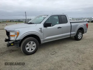 2021 Ford F-150 XL with VIN 1FTEX1CB2MKE77401, listed as a Copart auction lot 52754445 with 87,029 mi miles and Salvage title. Bid and sale history available at DreamBid. Image 1.