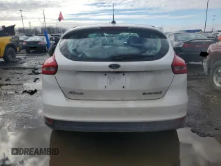 2016 Ford Focus Electric z VIN 1FADP3R41GL257400, wystawiony jako Copart lot #82003833 z przebiegiem 69 426 mil mil oraz . Historia ofert i sprzedaży dostępna na DreamBid. Obrazek 6.
