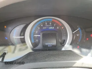 2011 Honda Insight EX z VIN JHMZE2H78BS000453, wystawiony jako Copart lot #58771715 z przebiegiem 183 326 mil mil oraz Szkoda całkowita • Salvage title. Historia ofert i sprzedaży dostępna na DreamBid. Obrazek 9.