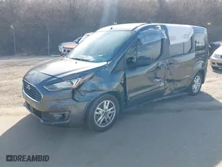 2019 Ford Transit Connect Wagon XLT with VIN NM0GE9F22K1391241, listed as a IAAI auction lot 41601446 with 127,161 mi miles. Bid and sale history available at carsss.com. Image 2.