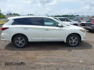 2020 Infiniti QX60 Luxe with VIN 5N1DL0MM2LC506031, listed as a IAAI auction lot 42701561 with 31,424 mi miles and . Bid and sale history available at DreamBid. Image 13.