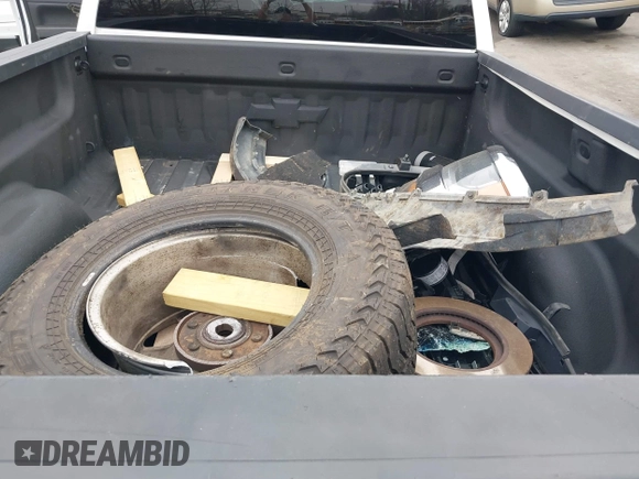 2018 Chevrolet Silverado 1500 LT with VIN 1GCUKREC0JF208509, listed as a IAAI auction lot 41794616 with 96,962 mi miles and . Bid and sale history available at DreamBid. Image 12.