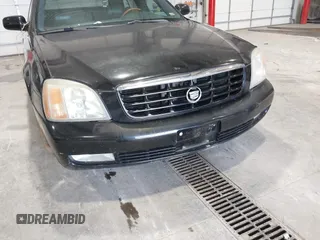2002 Cadillac DeVille DTS with VIN 1G6KF579X2U141648, listed as a IAAI auction lot 42059624 with 179,338 mi miles. Bid and sale history available at carsss.com. Image 6.
