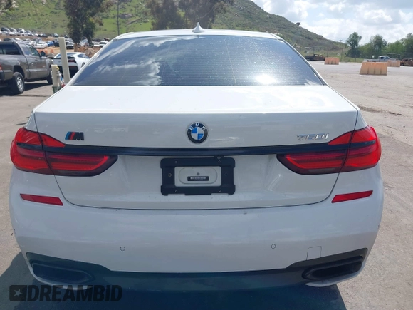 2017 BMW 7 Series 750i with VIN WBA7F0C32HGM22273, listed as a IAAI auction lot 41857151 with 90,518 mi miles and . Bid and sale history available at carsss.com. Image 16.