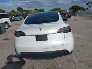 2023 Tesla Model Y Long Range z VIN 7SAYGDEE0PA128888, wystawiony jako IAAI lot #41410085 z przebiegiem 12 578 mil mil oraz . Historia ofert i sprzedaży dostępna na DreamBid. Obrazek 16.