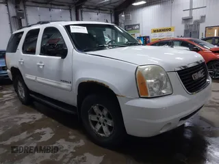 2007 GMC Yukon SLT z VIN 1GKFK13097R335239, wystawiony jako IAAI lot #41906570 z przebiegiem 274 014 mil mil oraz . Historia ofert i sprzedaży dostępna na DreamBid. Obrazek 1.