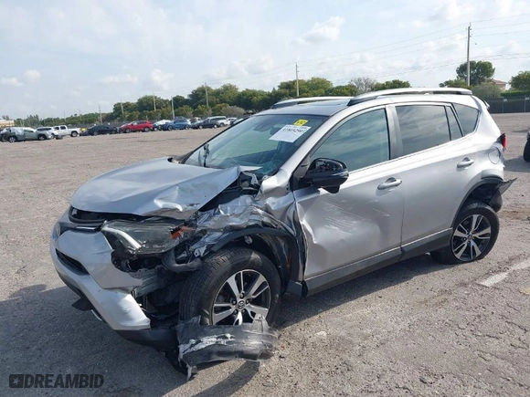 2018 Toyota RAV4 XLE with VIN 2T3WFREV5JW407424, listed as a IAAI auction lot 41869290 with 111,413 mi miles. Bid and sale history available at carsss.com. Image 2.